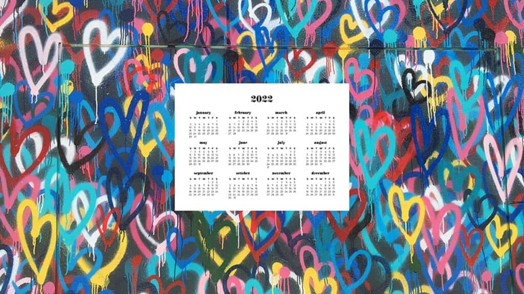 spray paint hearts layered with 2022 full-year calendar for your desktop