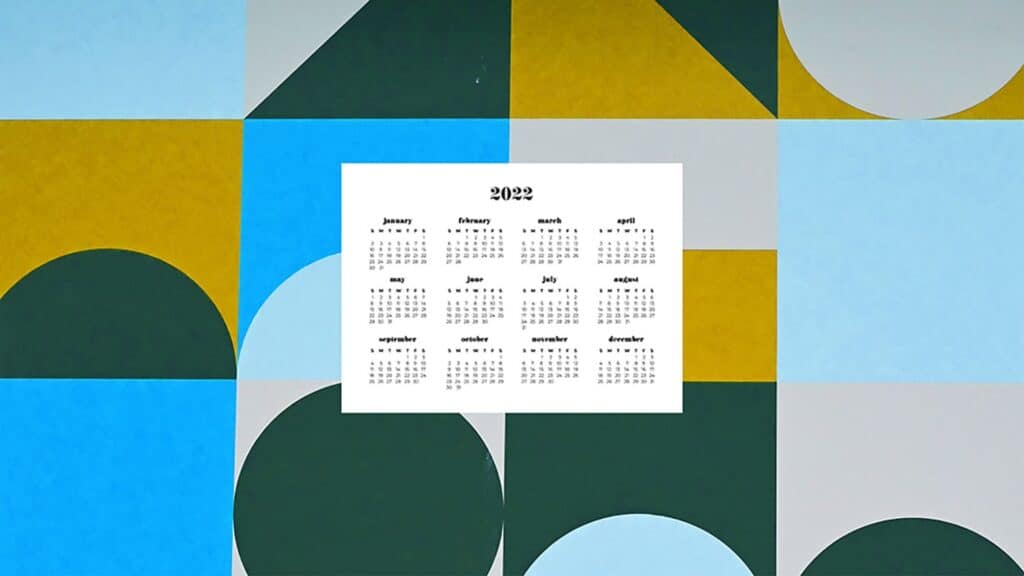 retro green and blue shapes with 2022 full-year calendar 