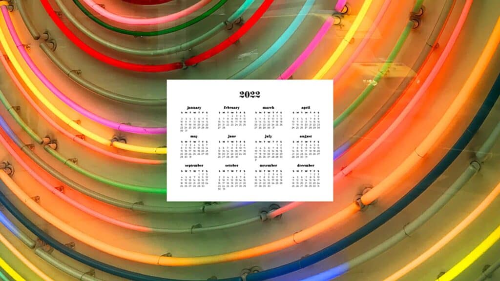 neon circle lights in rainbow colors with 2022 full-year calendar 