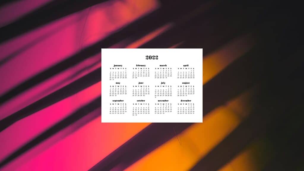 pink and orange lights and shadows on wall with free 2022 wallpapers full-year calendar for your desktop 
