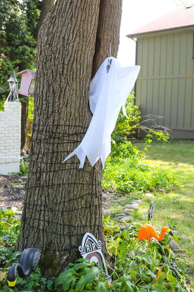 ghosts hanging in tree