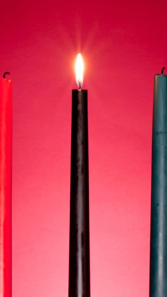 photo of kwanzaa colorful candles on red background - december digital wallpaper