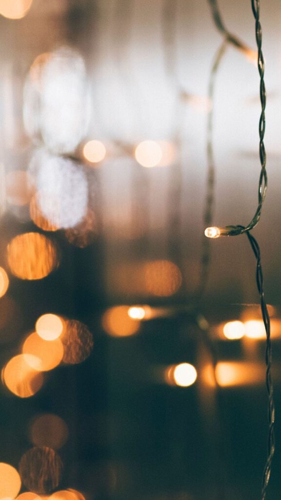 holiday curtain lights with blurred bokeh coziness - december digital wallpapers