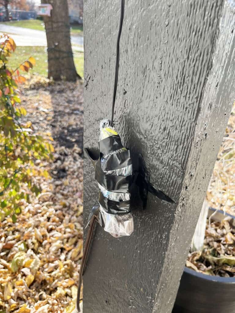 electrical tape on outdoor light plugs