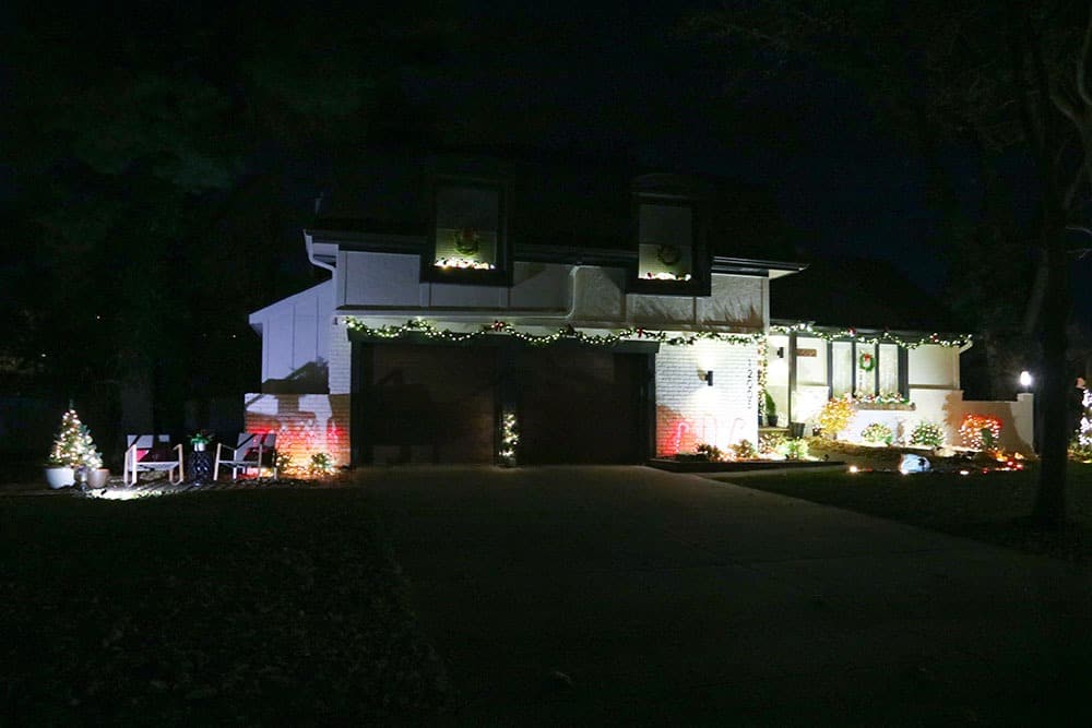 Outdoor holiday decor tour – A classic red and white Christmas look on a smaller budget. Come see how it looks all lit up at nighttime!