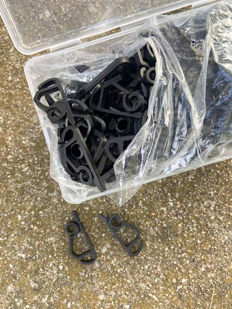 black gutter clips to hang lights and garland