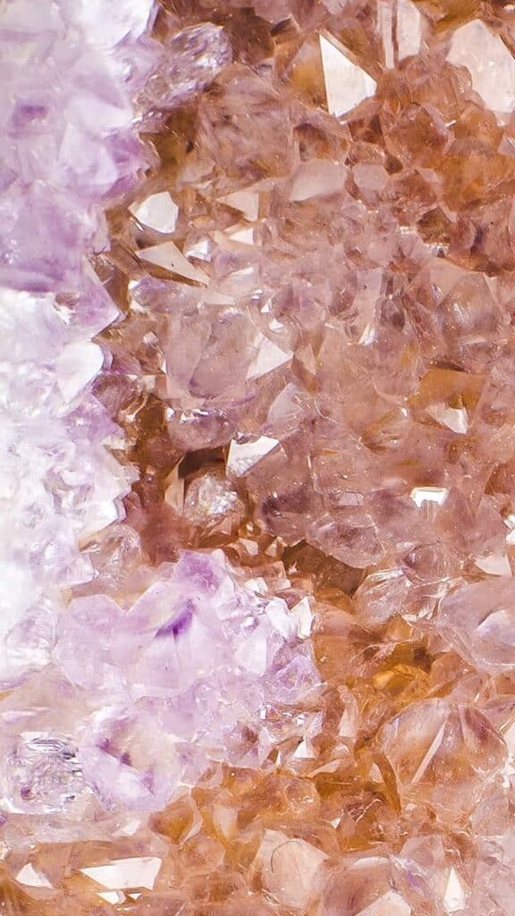 purple lilac and peach cream colored crystals close up