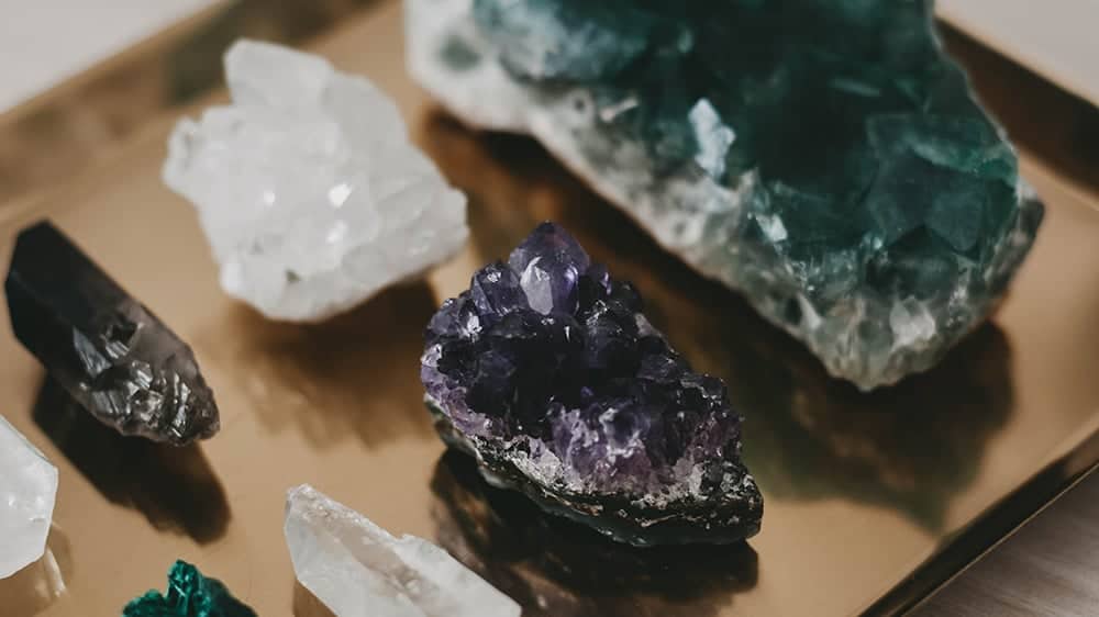 different crystals on a pretty tray