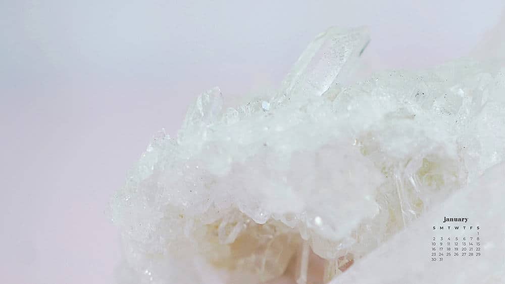 white quartz crystal on light pink background