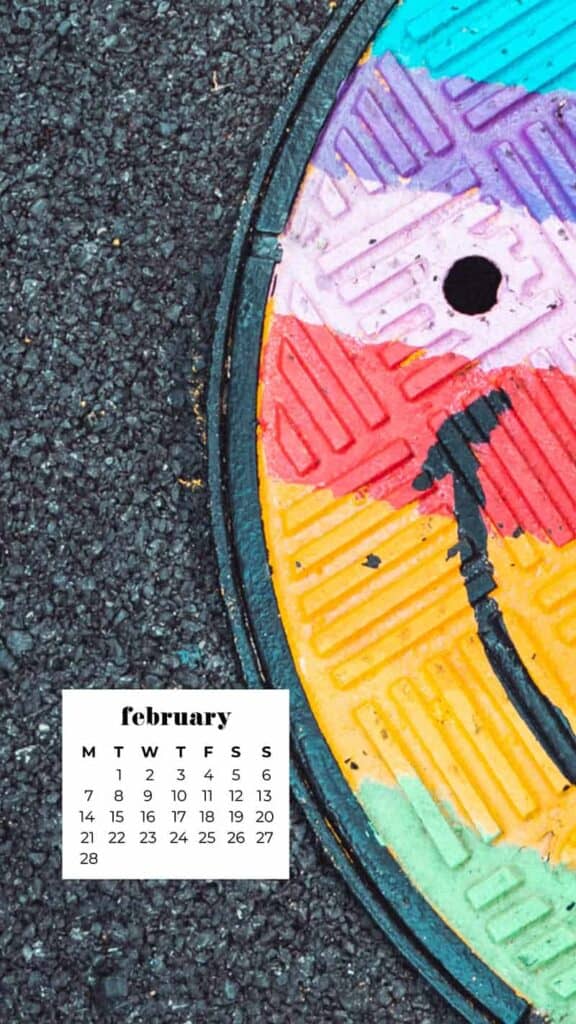 rainbow painted smiley face man hole drain cover - February 2022 wallpapers – 50 FREE calendars for your desktop & phone!