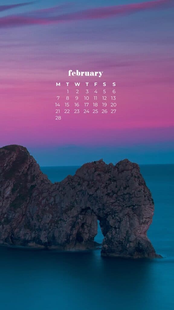 February 2022 Cliffs on the ocean at sunset - February 2022 wallpapers – 50 FREE calendars for your desktop & phone!