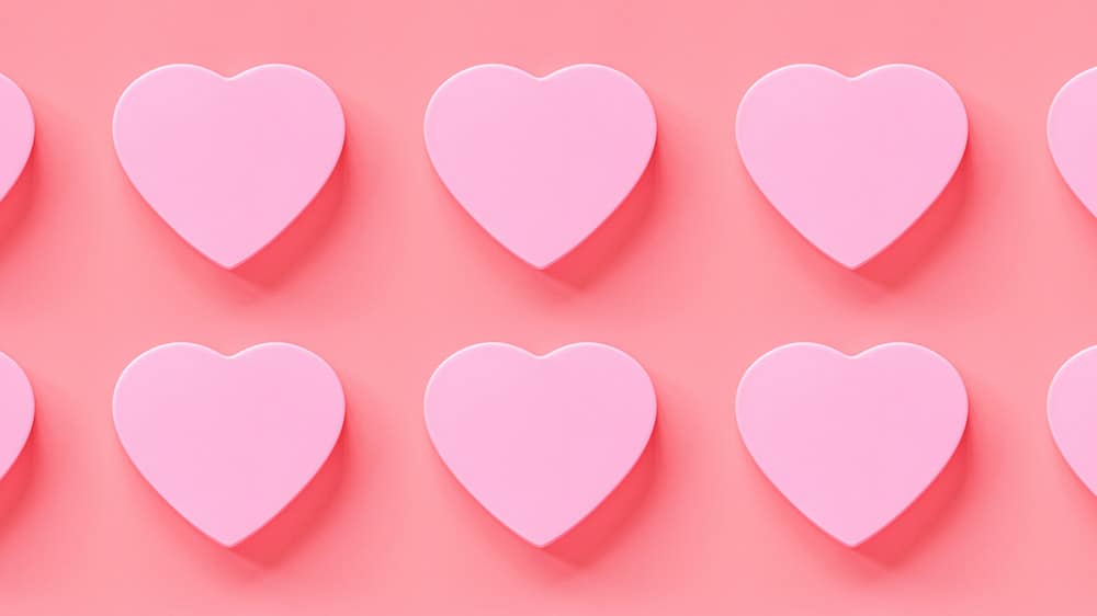 February 2022 pink hearts on coral pink background
