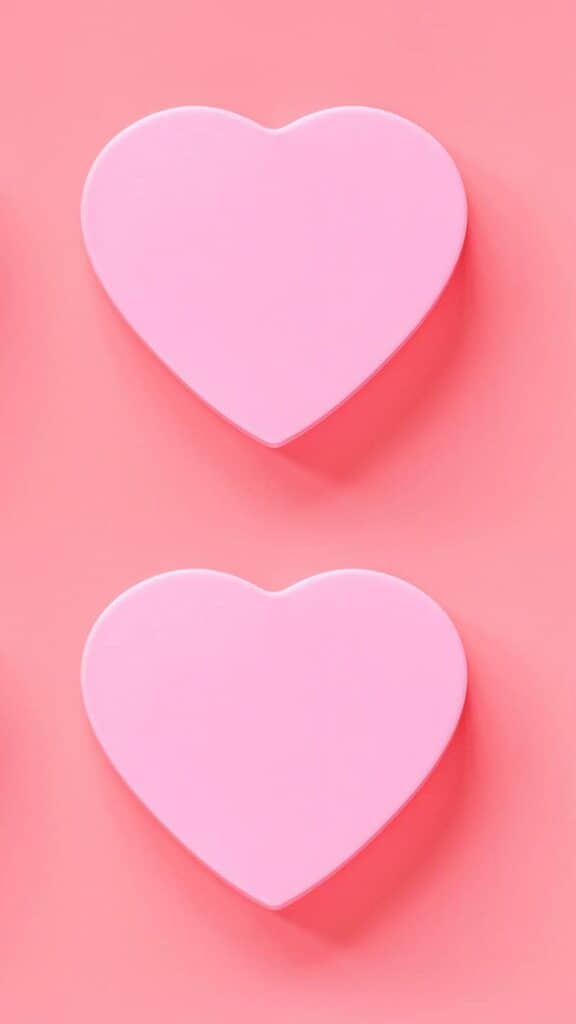 pink hearts on coral pink background