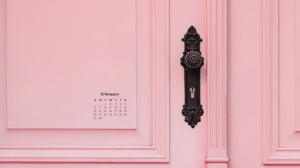 pretty detailed pink exterior front door with cool, old door knob - February 2022 wallpapers – 50 FREE calendars for your desktop & phone!