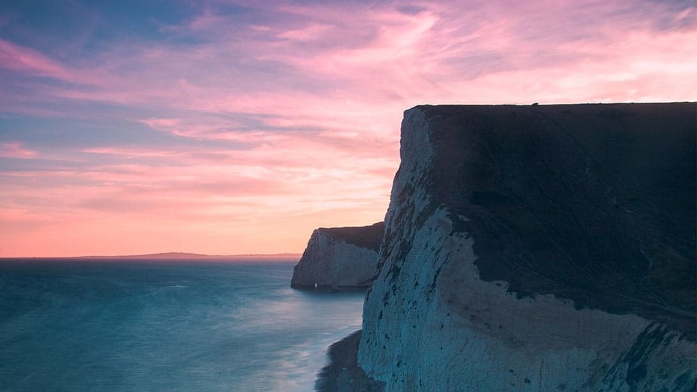 cliffs on the ocean coast at sunset