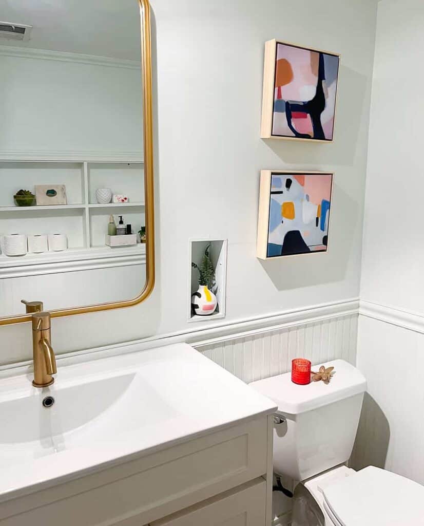 coordinating colorful and modern half bath connected to laundry room