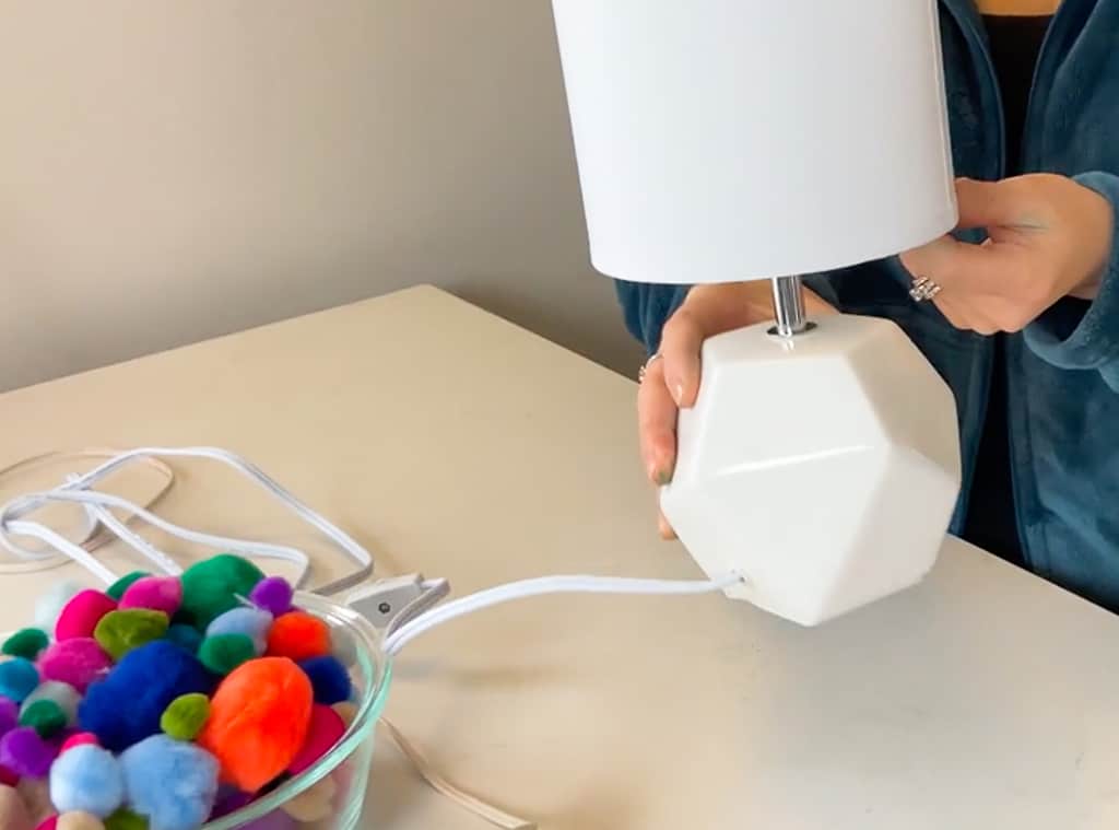 Rainbow wood slice and pom pom lamp – Colorful, fun, and easy DIY decor ideas for a kid's room or birthday party activity!