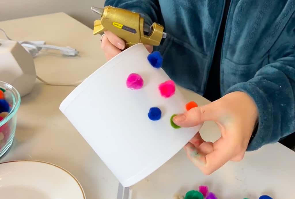 Rainbow wood slice and pom pom lamp – Colorful, fun, and easy DIY decor ideas for a kid's room or birthday party activity!