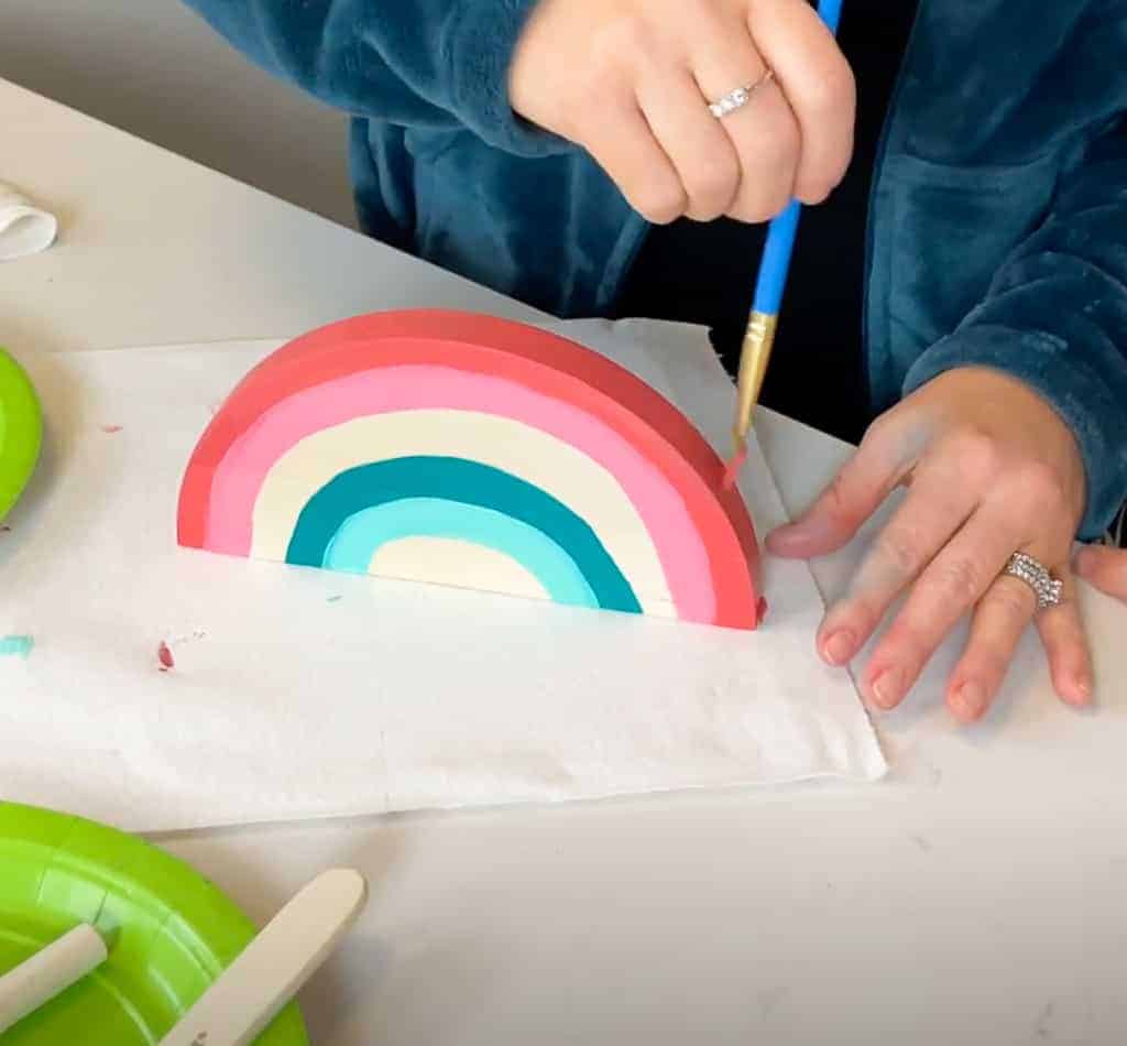 Rainbow wood slice and pom pom lamp – Colorful, fun, and easy DIY decor ideas for a kid's room or birthday party activity!