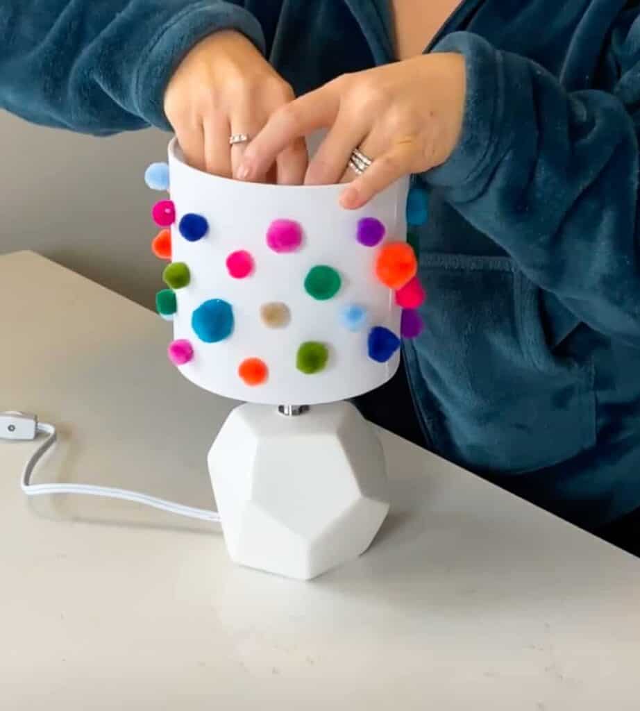 Rainbow wood slice and pom pom lamp – Colorful, fun, and easy DIY decor ideas for a kid's room or birthday party activity!