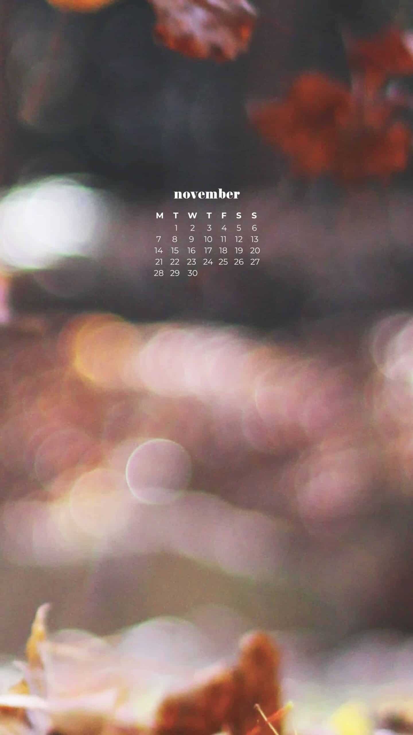 fall autumn leaves falling with blurred background November 2022 wallpapers – FREE calendars in Sunday & Monday starts + no-calendar designs. 59 beautiful options for desktop & smart phones!