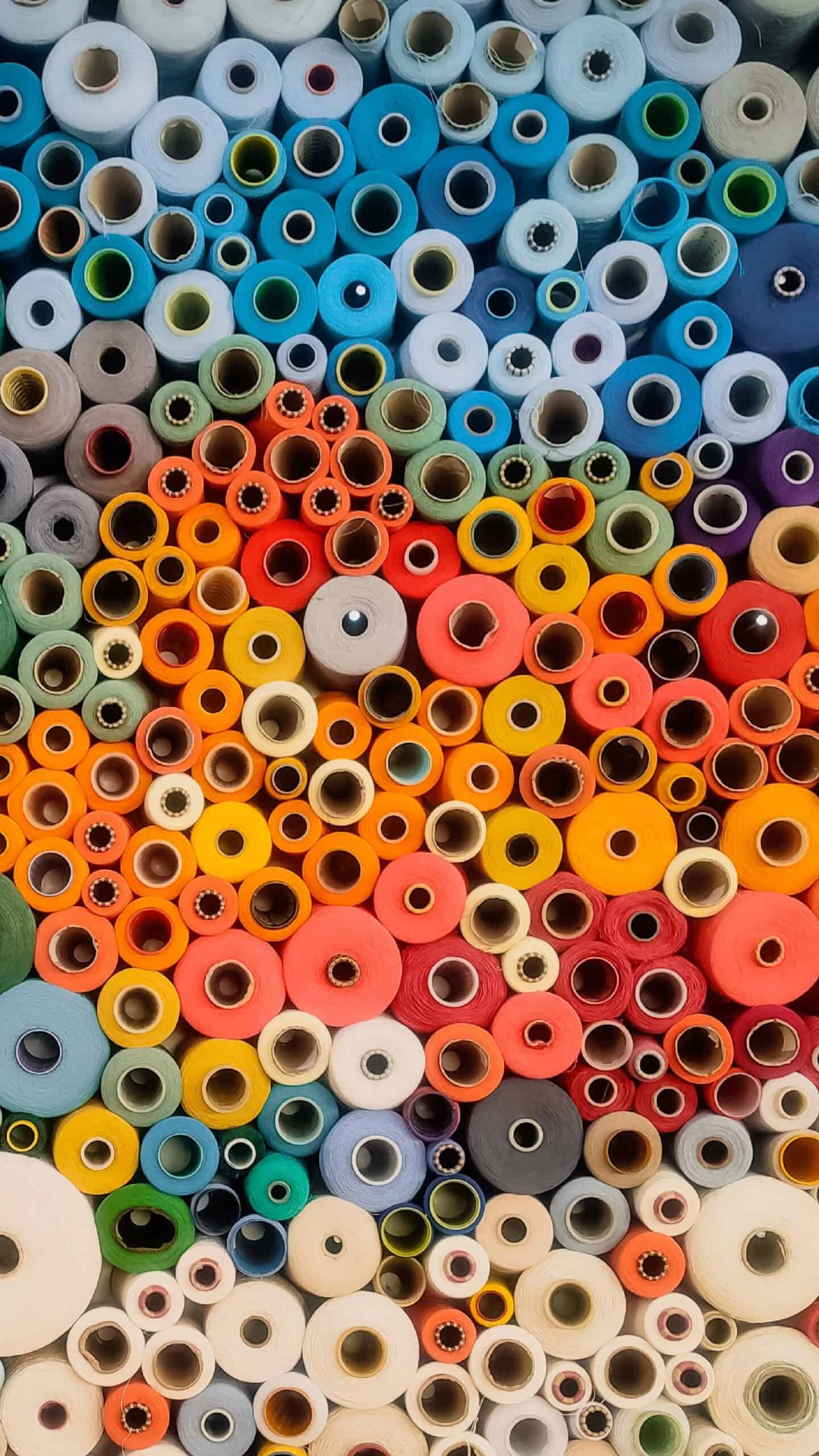 colorful rolls of fabric stacked on a shelf November 2022 wallpapers – FREE calendars in Sunday & Monday starts + no-calendar designs. 59 beautiful options for desktop & smart phones!