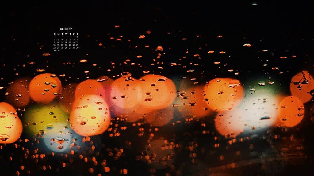 bokeh orange, yellow, and blue lights through a rainy windshield October 2022 wallpapers – FREE calendars in Sunday & Monday starts + no-calendar designs. 55 beautiful options for desktop & smart phones!