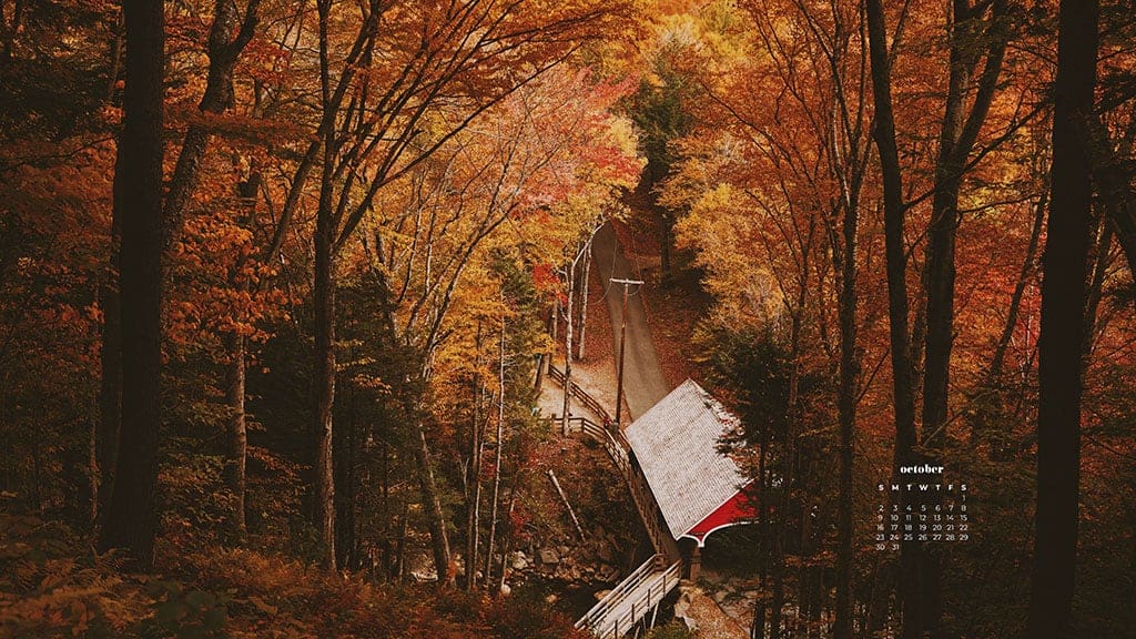 fall leaves on a country road with an old red wood covered bridge October 2022 wallpapers – FREE calendars in Sunday & Monday starts + no-calendar designs. 55 beautiful options for desktop & smart phones!