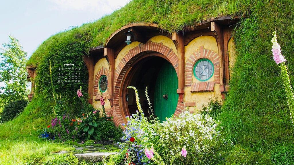 cute little gnome house with green door and pretty flowers October 2022 wallpapers – FREE calendars in Sunday & Monday starts + no-calendar designs. 55 beautiful options for desktop & smart phones!