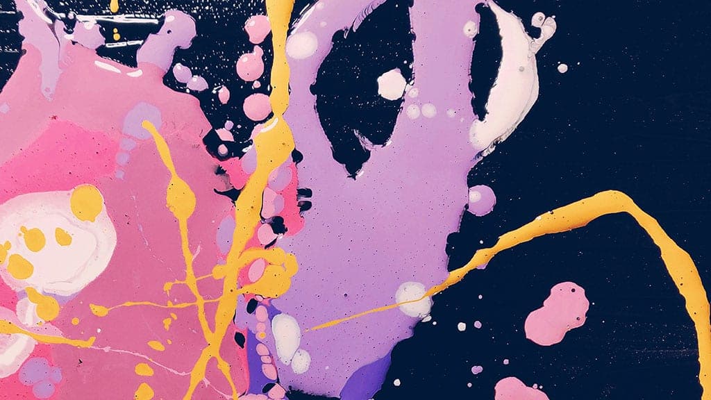 drip paint in pink, purple, yellow, navy, and white 