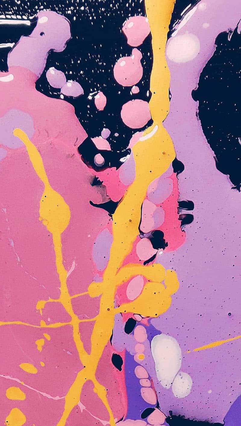 drip paint in pink, purple, yellow, navy, and white