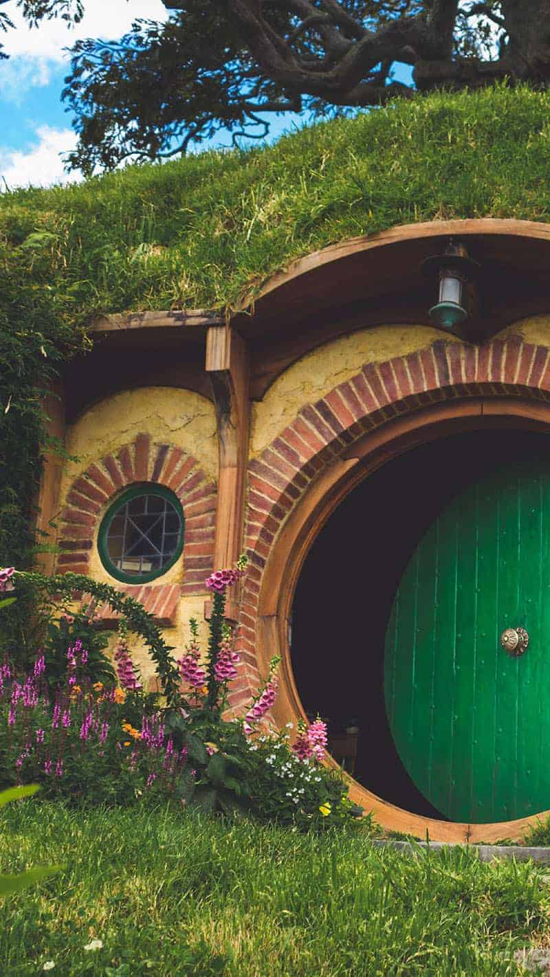 colorful hobbit house with green front door