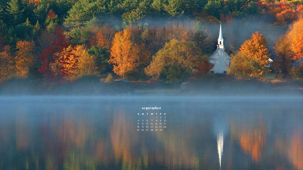 fall trees and an old white church with lake reflection September 2022 wallpapers – FREE calendars in Sunday & Monday starts + no-calendar designs. 55 beautiful options for desktop & smart phones!