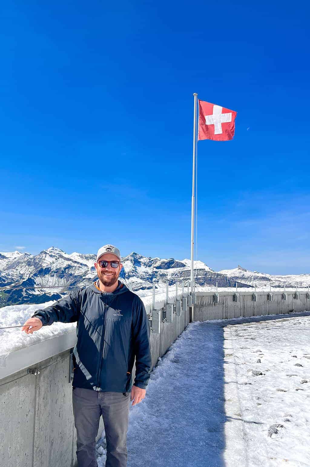 Jungfraujoch – Top of Europe Adventure – view off of the cable car by the Swiss flag