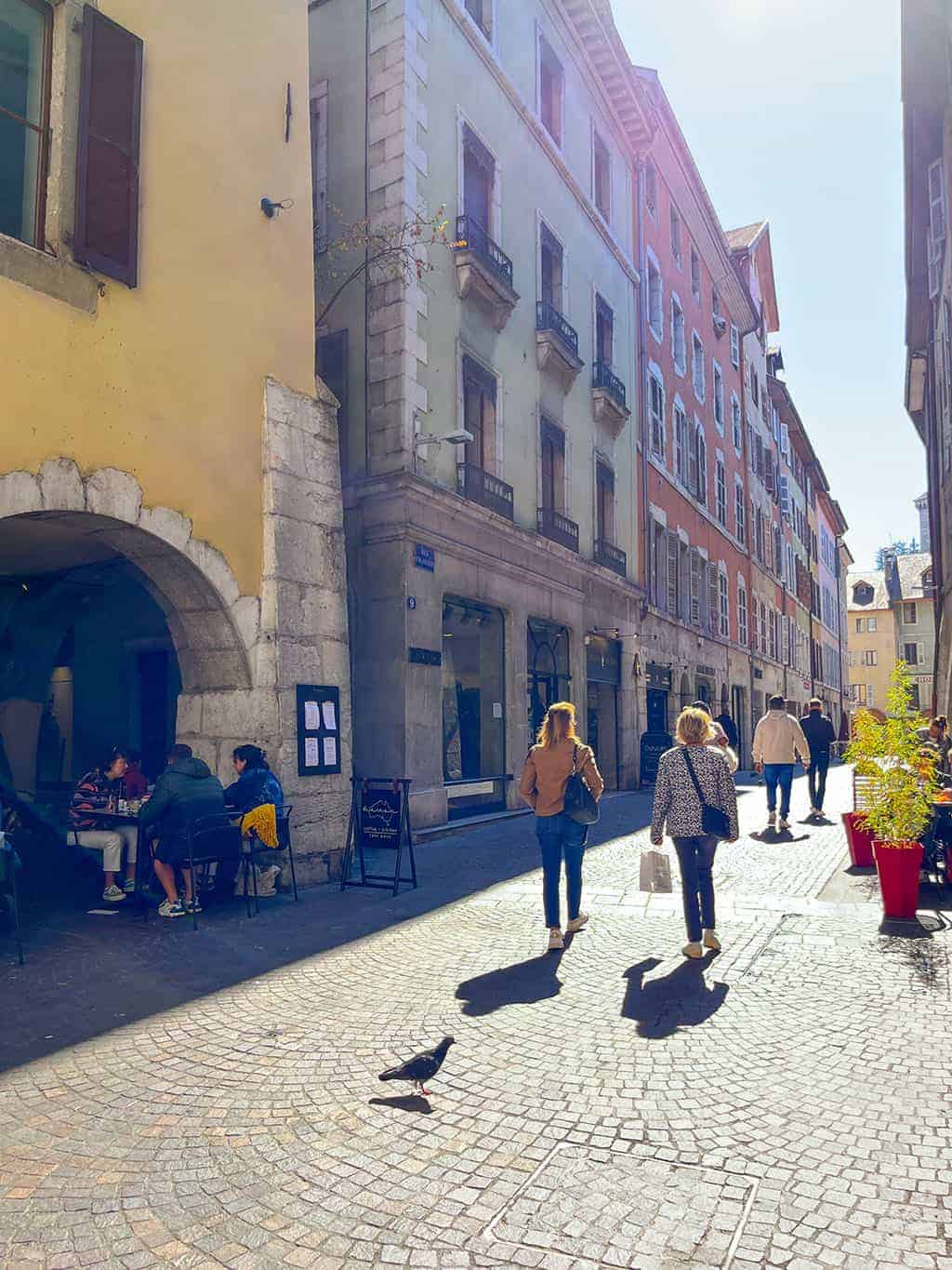 Day trip to Annecy France - Cobblestone streets, colorful architecture, and a stunning crystal blue lake.