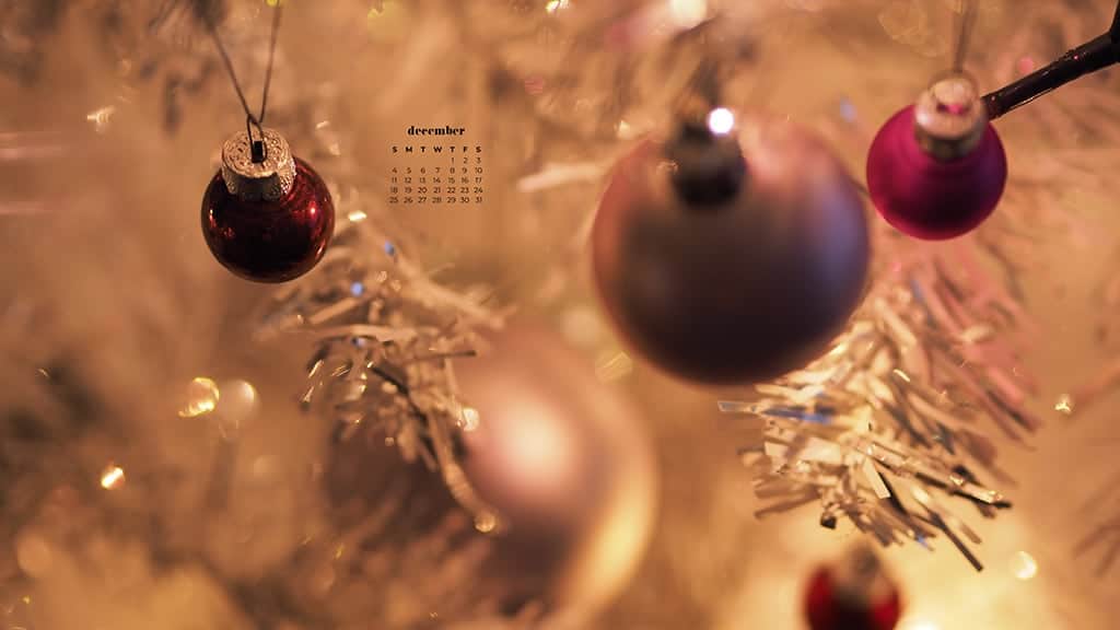 pretty silver christmas tree with pink toned ornaments