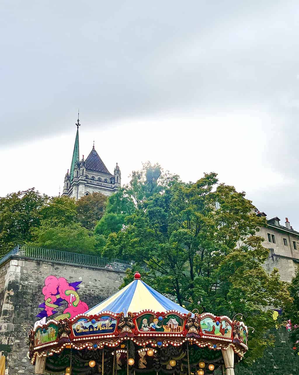 Geneva Geneva old town area carousel and church 