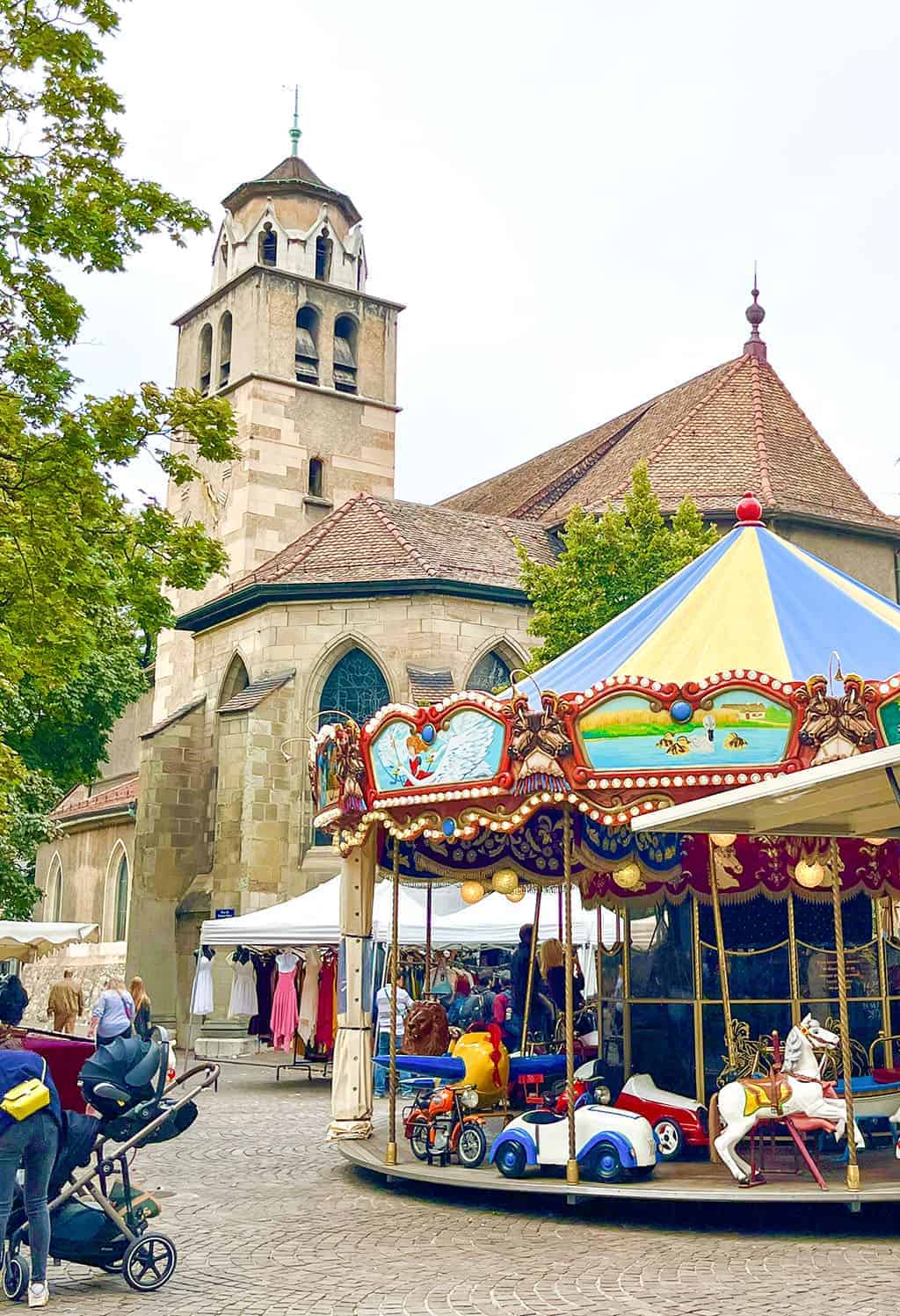 Geneva Geneva old town area carousel and church 