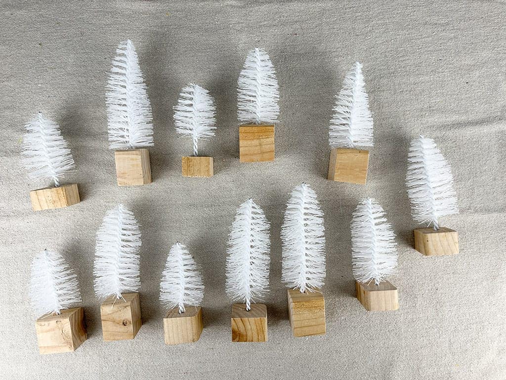 diy bottle brush trees made from toilet brushed and wood scraps