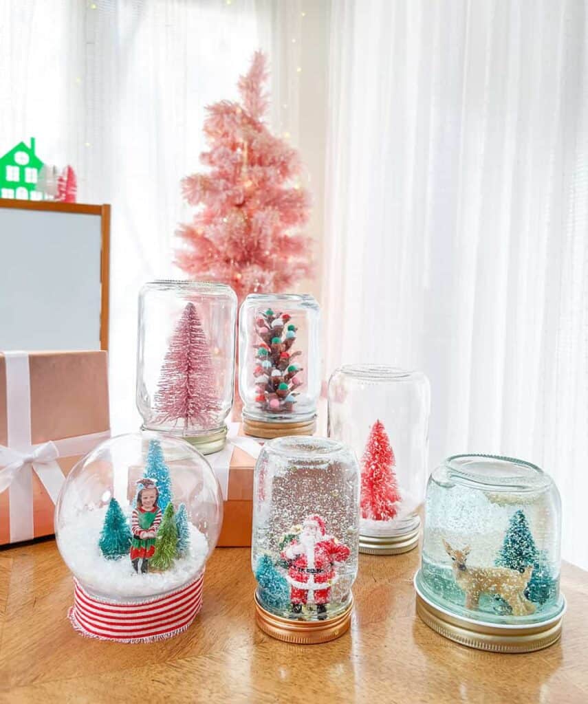 DIY holiday snow globes are SO fun and extremely easy! They also make great holiday gifts for anyone at any age. You have to try them! 