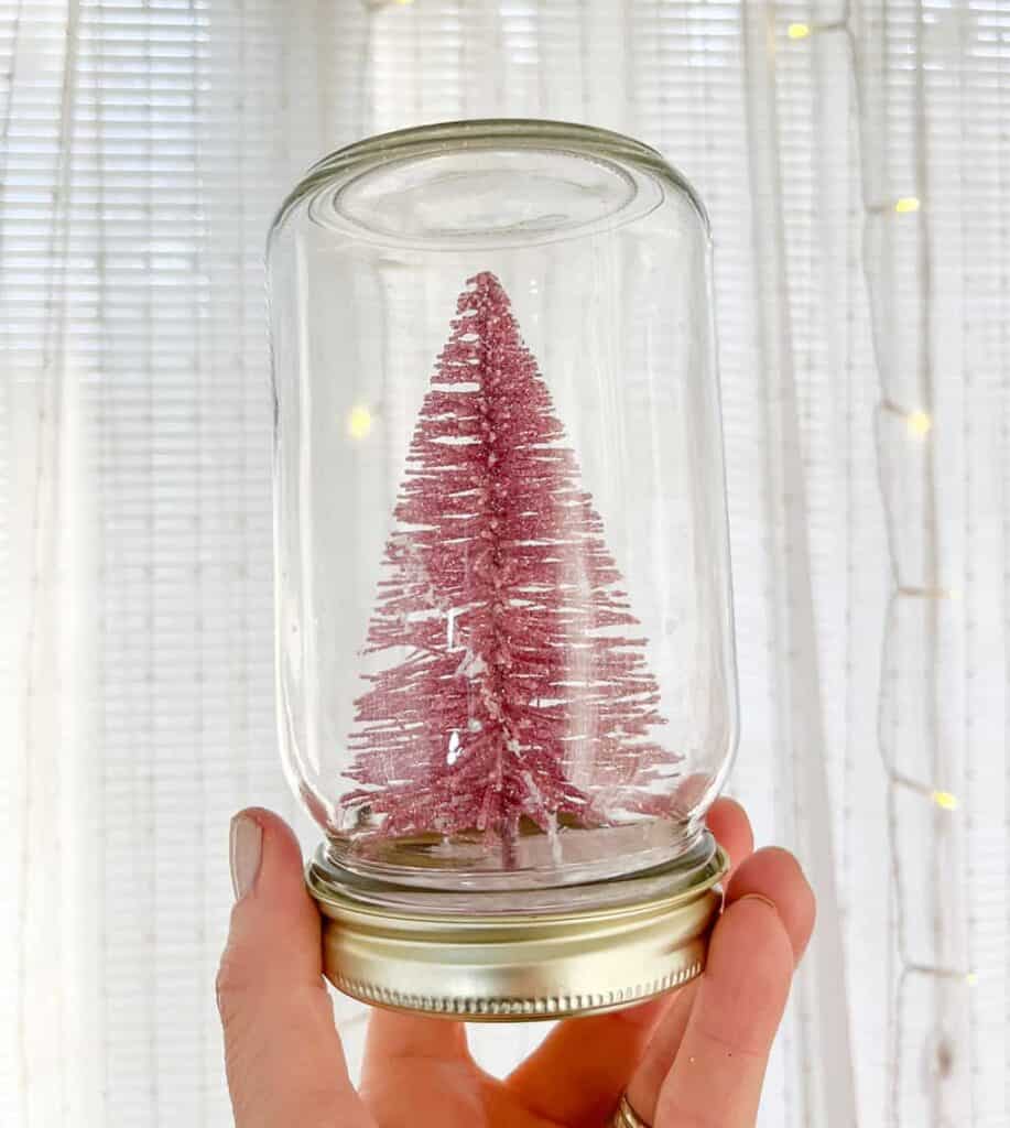 DIY holiday snow globes are SO fun and extremely easy! They also make great holiday gifts for anyone at any age. You have to try them! 