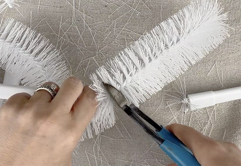 cut toilet brushes into 2 sections using wire cutters